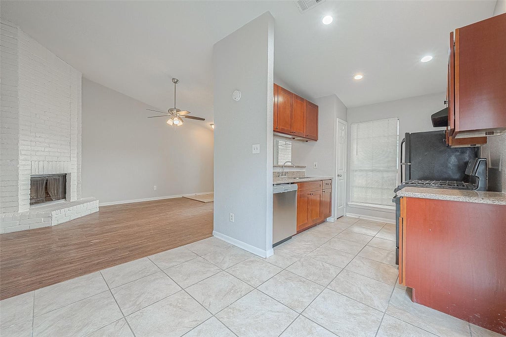 Photo of 11203 Pender Lane, Houston, TX 77477 (MLS # 55450232)