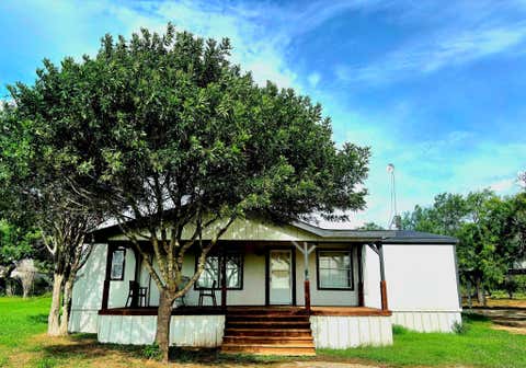 Photo of 560 S View Street, Lytle, TX 78052 (MLS # 12553974)