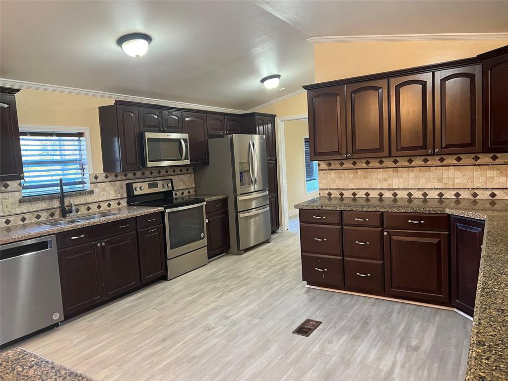Photo of 1801 Wallisville Road, Liberty, TX 77575 (MLS # 84589069)