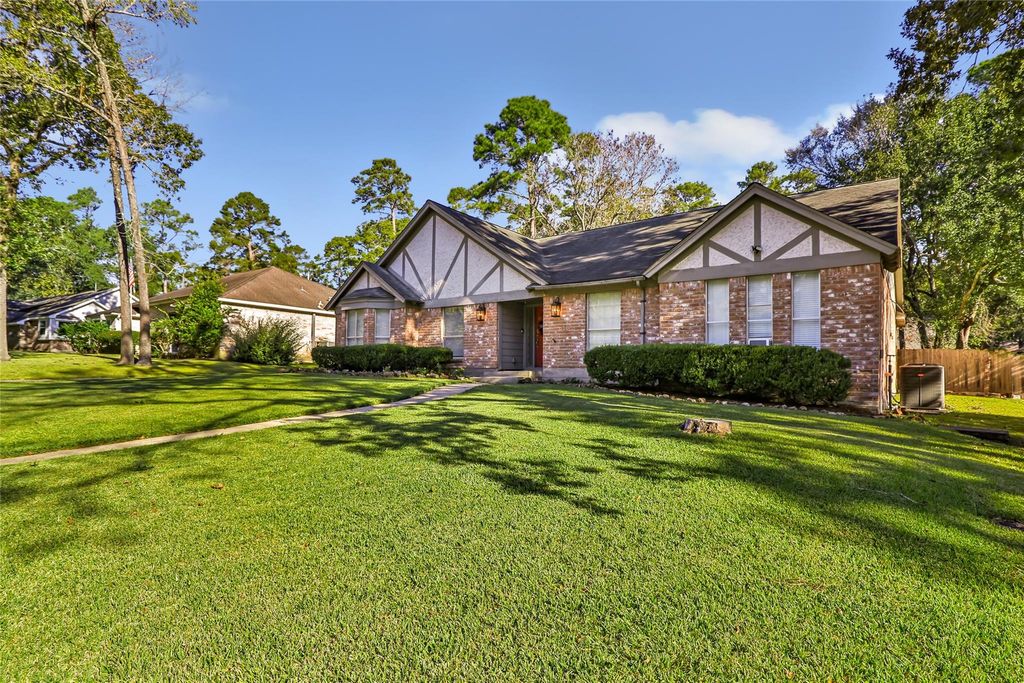 Photo of 2111 Woodland Valley Drive, Houston, TX 77339 (MLS # 84785231)