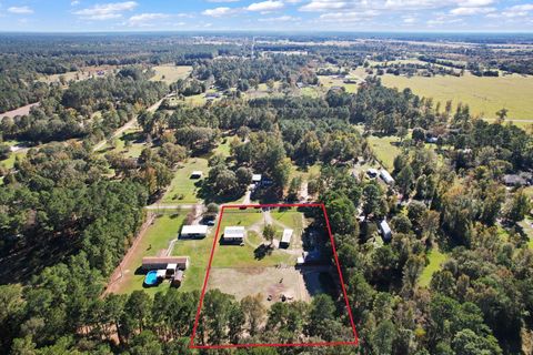 Photo of 211 County Road 2292, Cleveland, TX 77327 (MLS # 79827179)