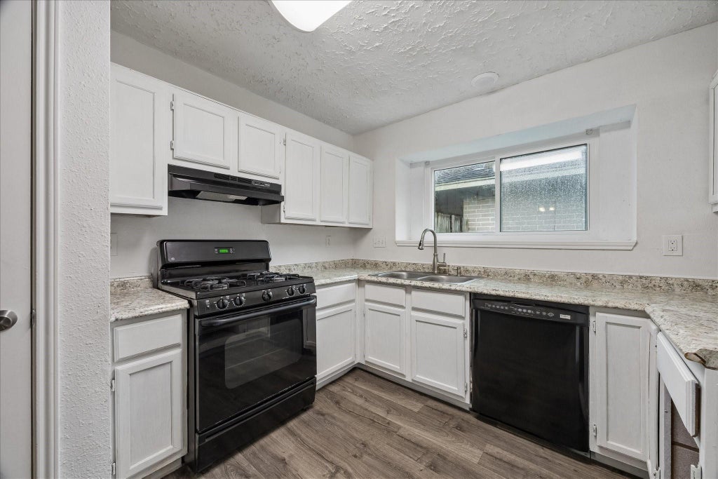 Photo of 16715 Benchmark Drive, Houston, TX 77053 (MLS # 30122388)