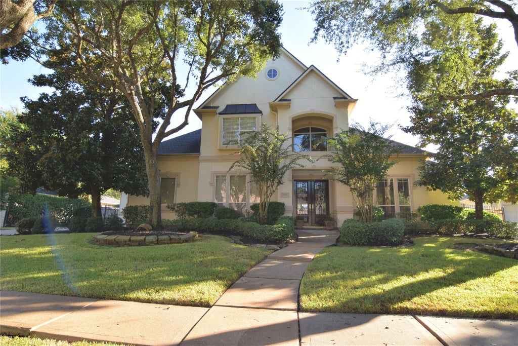 Photo of 3010 Acorn Wood Way, Houston, TX 77059 (MLS # 73208238)
