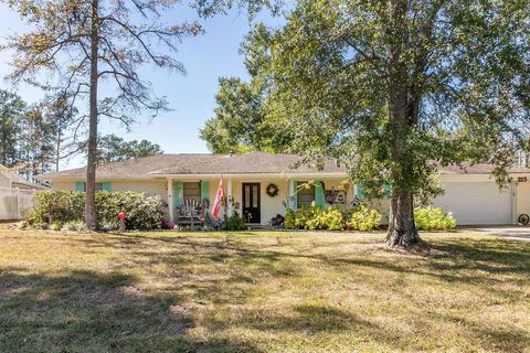 Photo of 215 W Wildwood Drive N, Village Mills, TX 77663 (MLS # 26991231)