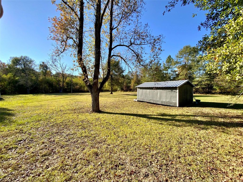 Photo of TBD Yaupon Cove Dr, Onalaska, TX 77360 (MLS # 44383673)