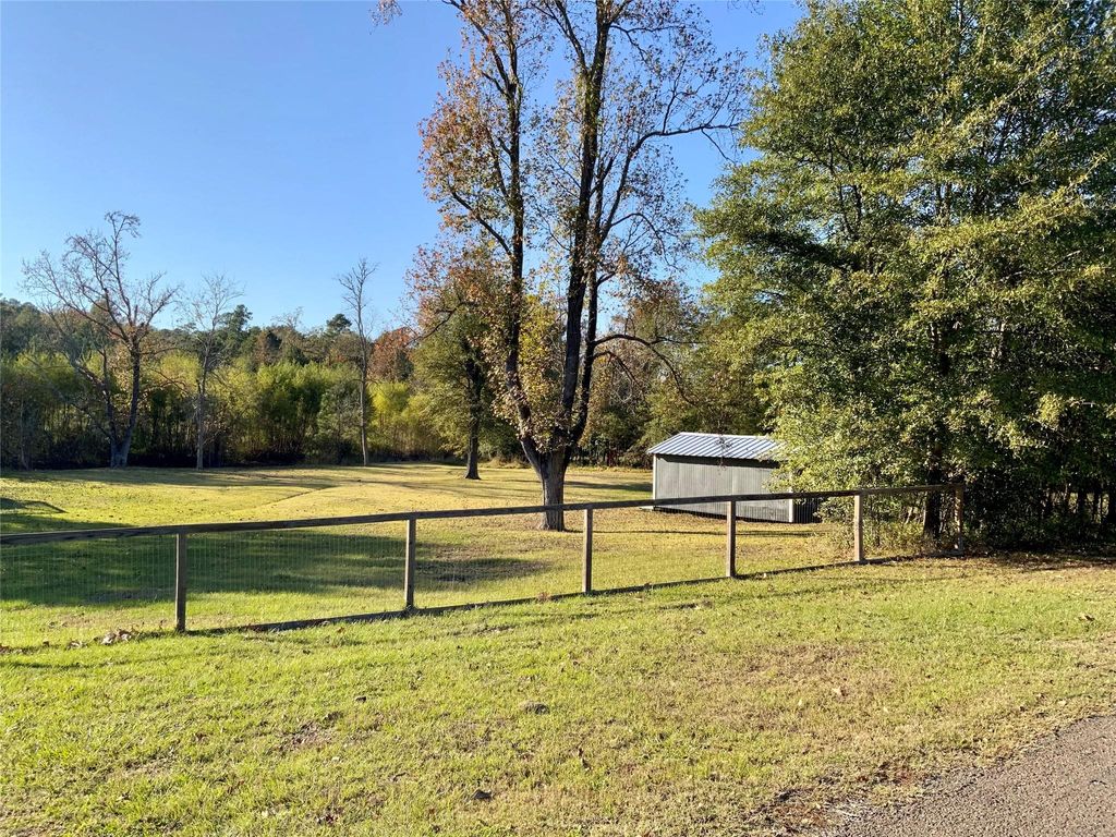 Photo of TBD Yaupon Cove Dr, Onalaska, TX 77360 (MLS # 44383673)