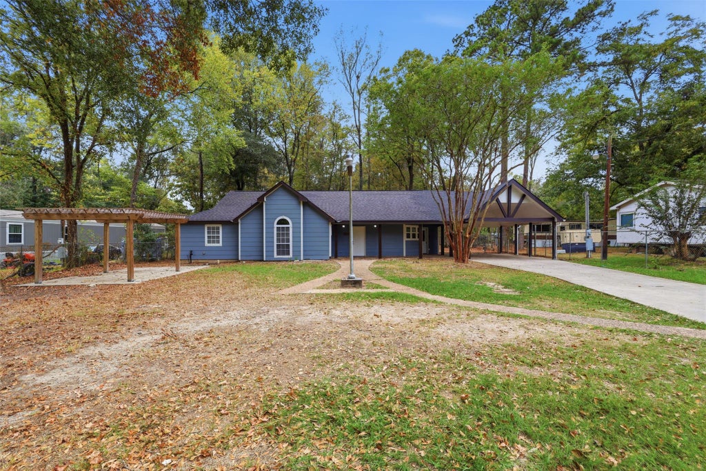 Photo of 21672 Mexican John Road, New Caney, TX 77357 (MLS # 67082172)