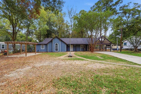 Photo of 21672 Mexican John Road, New Caney, TX 77357 (MLS # 67082172)