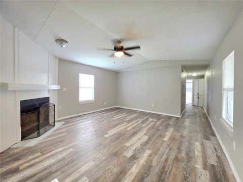 Photo of 310 Paddock Road #6, Willis, TX 77378 (MLS # 86442102)