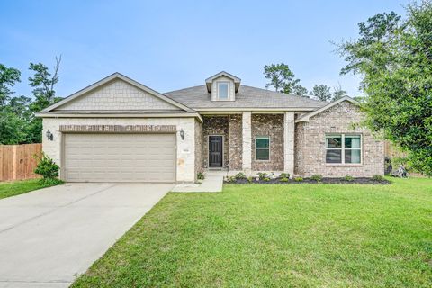 Photo of 9850 Hunter Springs Drive, Conroe, TX 77306 (MLS # 16863572)