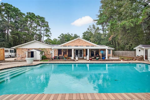 Photo of 1503 Memorial Drive, Conroe, TX 77304 (MLS # 89959251)