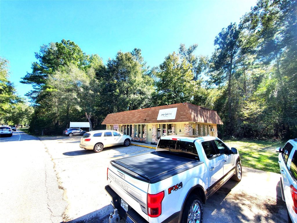 Photo of 1714 Roman Forest Boulevard, New Caney, TX 77357 (MLS # 36121267)