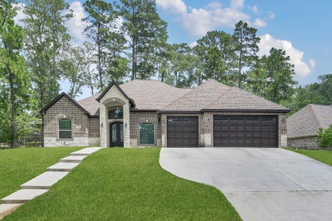 Photo of 2172 Greentree Drive Drive, Huntsville, TX 77340 (MLS # 89570906)