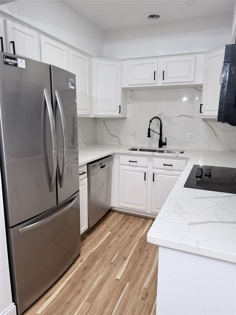 Photo of 2601 Bellefontaine Street #C308, Houston, TX 77025 (MLS # 30435778)