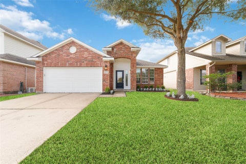 Photo of 20215 Enchanted Rose Lane, Cypress, TX 77433 (MLS # 79389349)