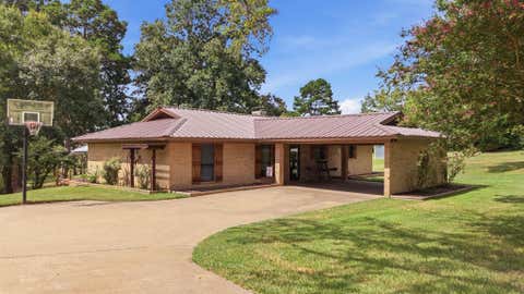 Photo of 813 El Camino Drive, Grapeland, TX 75844 (MLS # 70390418)