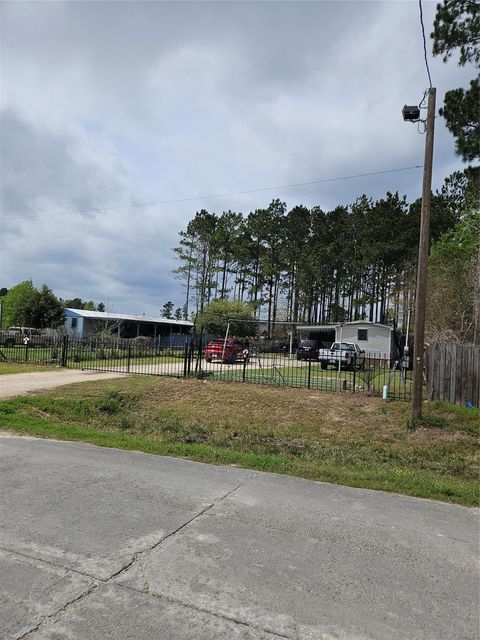 Photo of 86 County Road 3541, Cleveland, TX 77327 (MLS # 24008030)