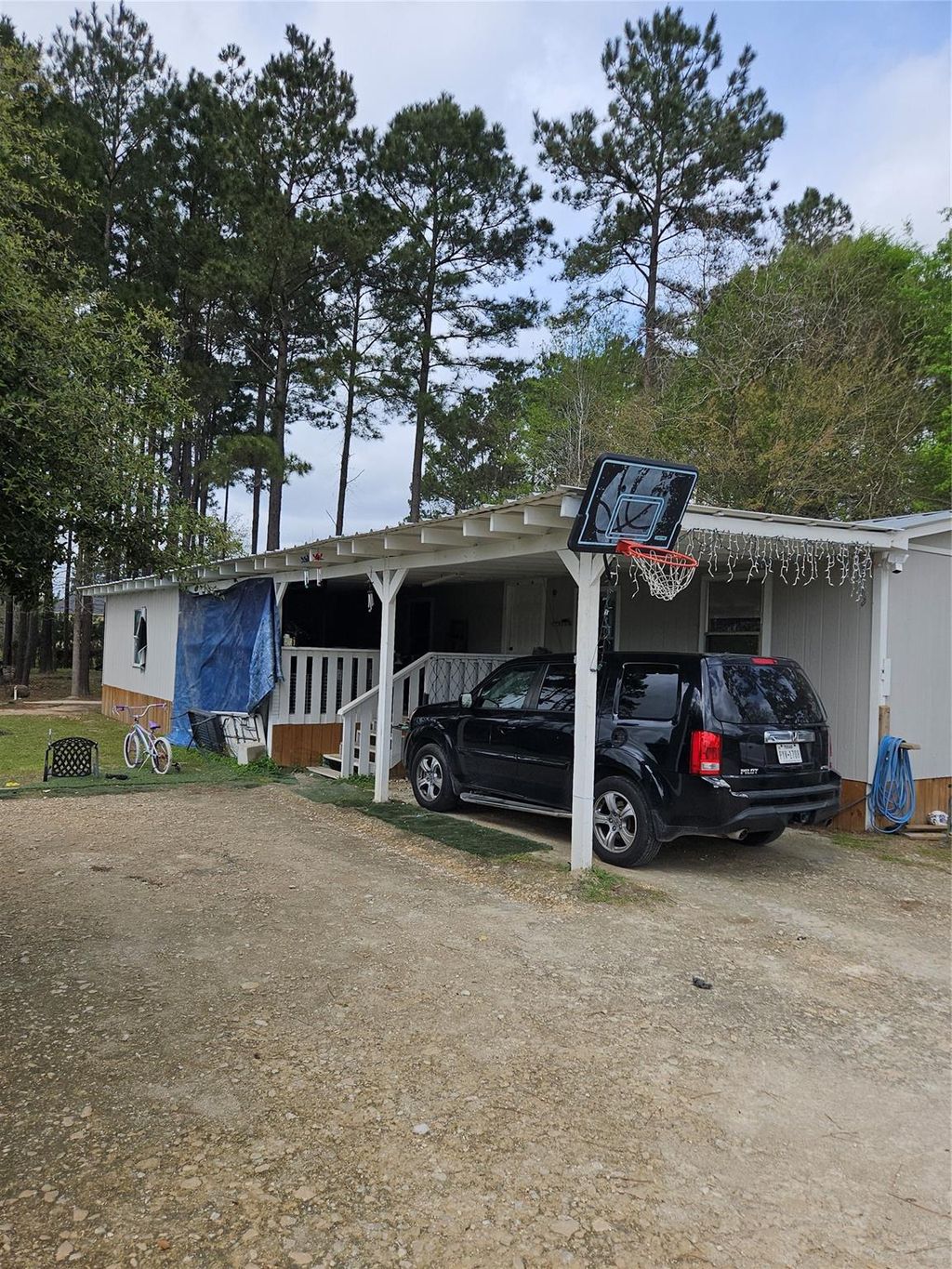 Photo of 86 County Road 3541, Cleveland, TX 77327 (MLS # 24008030)