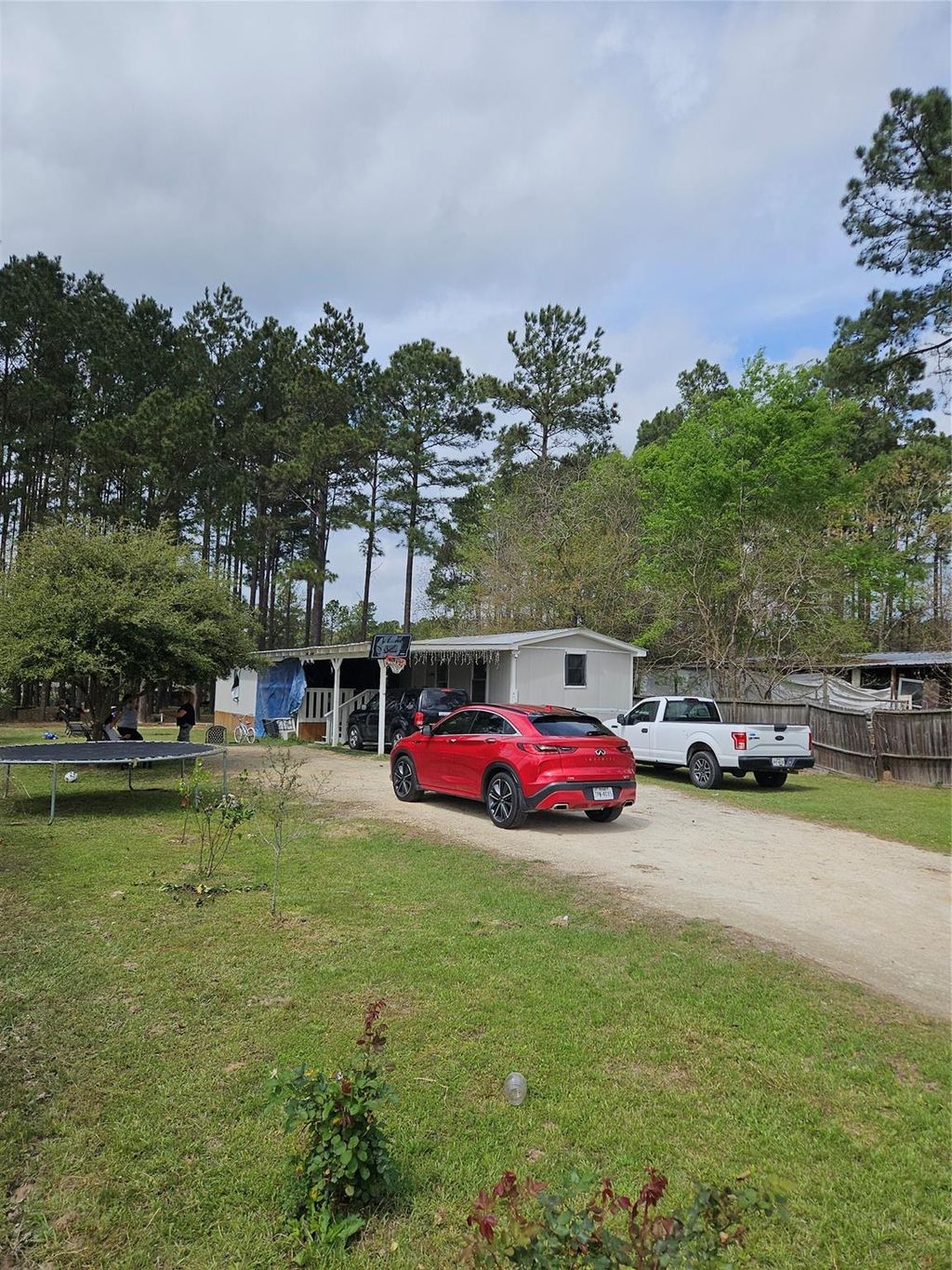 Photo of 86 County Road 3541, Cleveland, TX 77327 (MLS # 24008030)