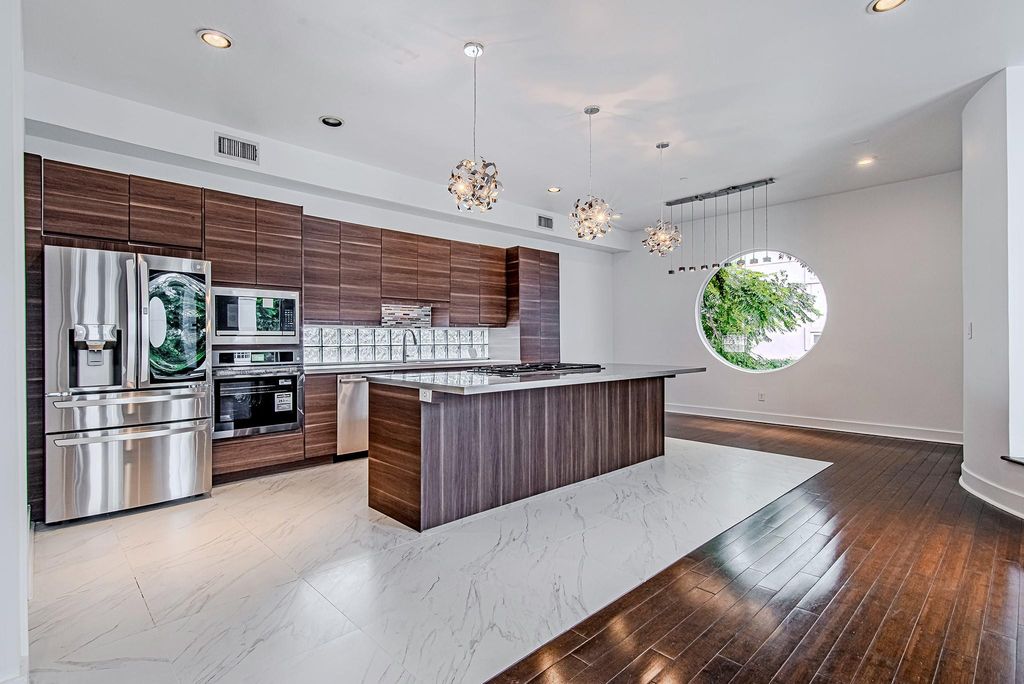 Photo of 2025 Colquitt Street #E, Houston, TX 77098 (MLS # 52117962)