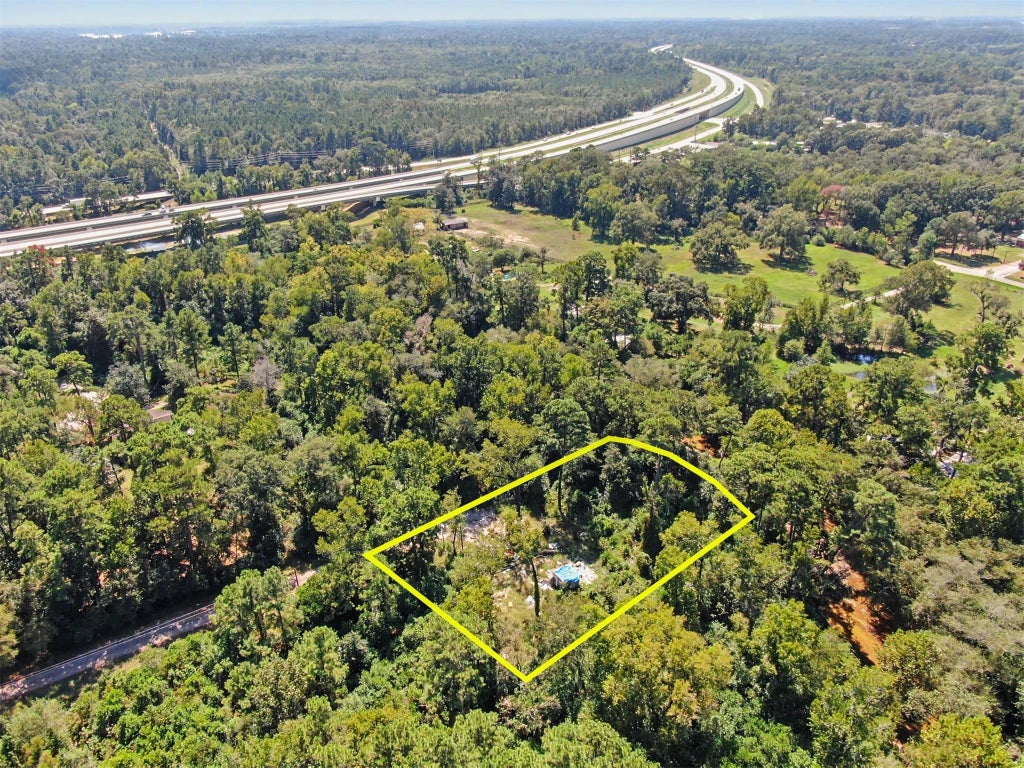 Photo of 25589 Peach Creek Drive, New Caney, TX 77357 (MLS # 27643335)