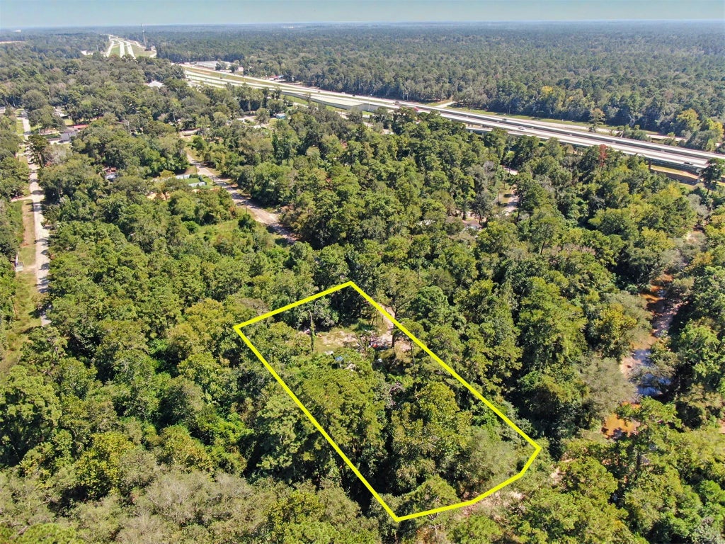 Photo of 25589 Peach Creek Drive, New Caney, TX 77357 (MLS # 27643335)