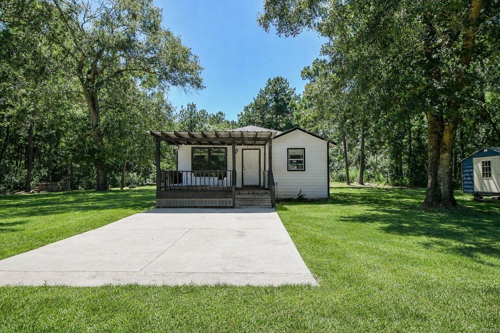 Photo of 180 Maurine Lane, Cleveland, TX 77328 (MLS # 87840237)