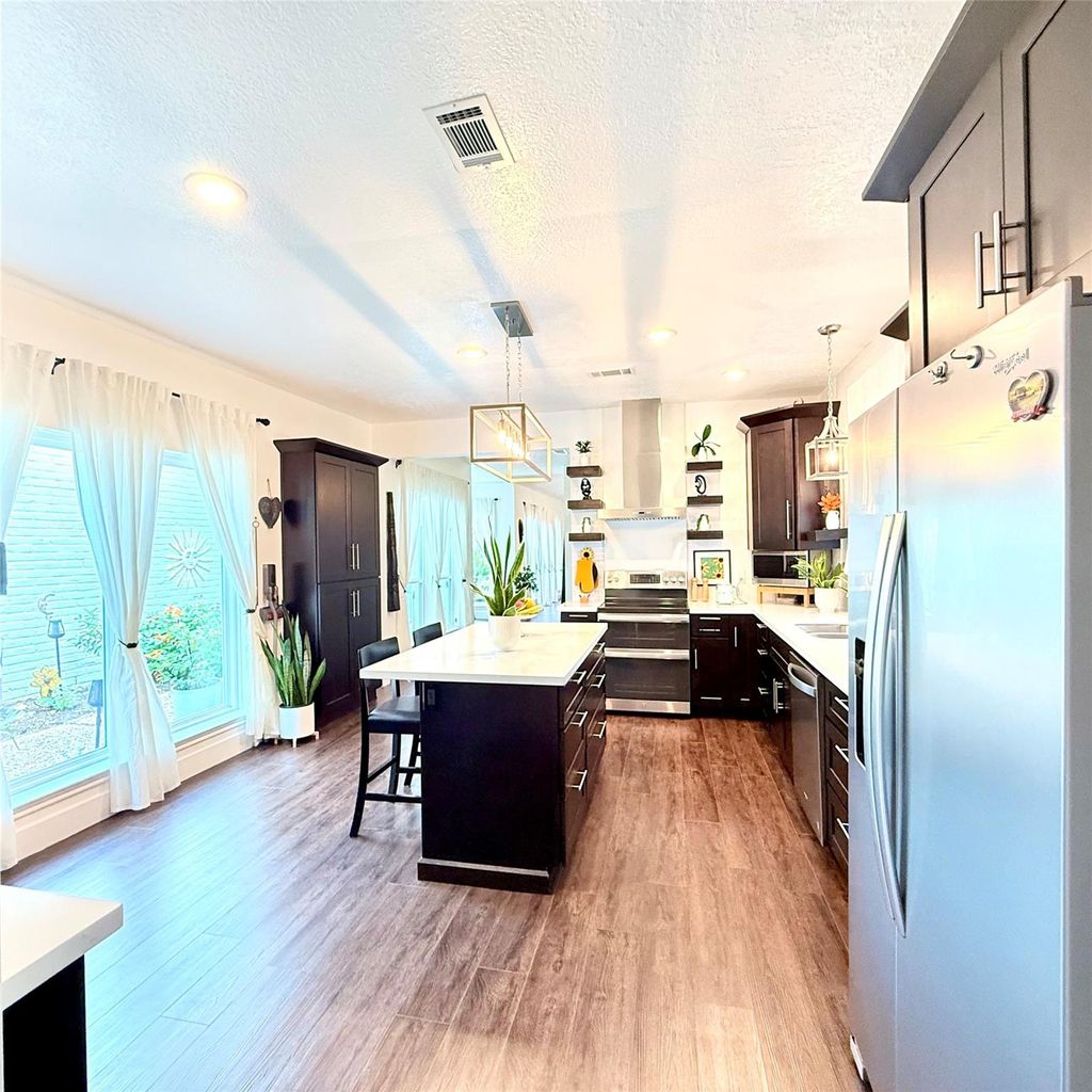 Photo of 11942 Briar Forest Drive, Houston, TX 77077 (MLS # 18282317)