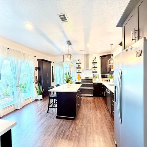 Photo of 11942 Briar Forest Drive, Houston, TX 77077 (MLS # 18282317)