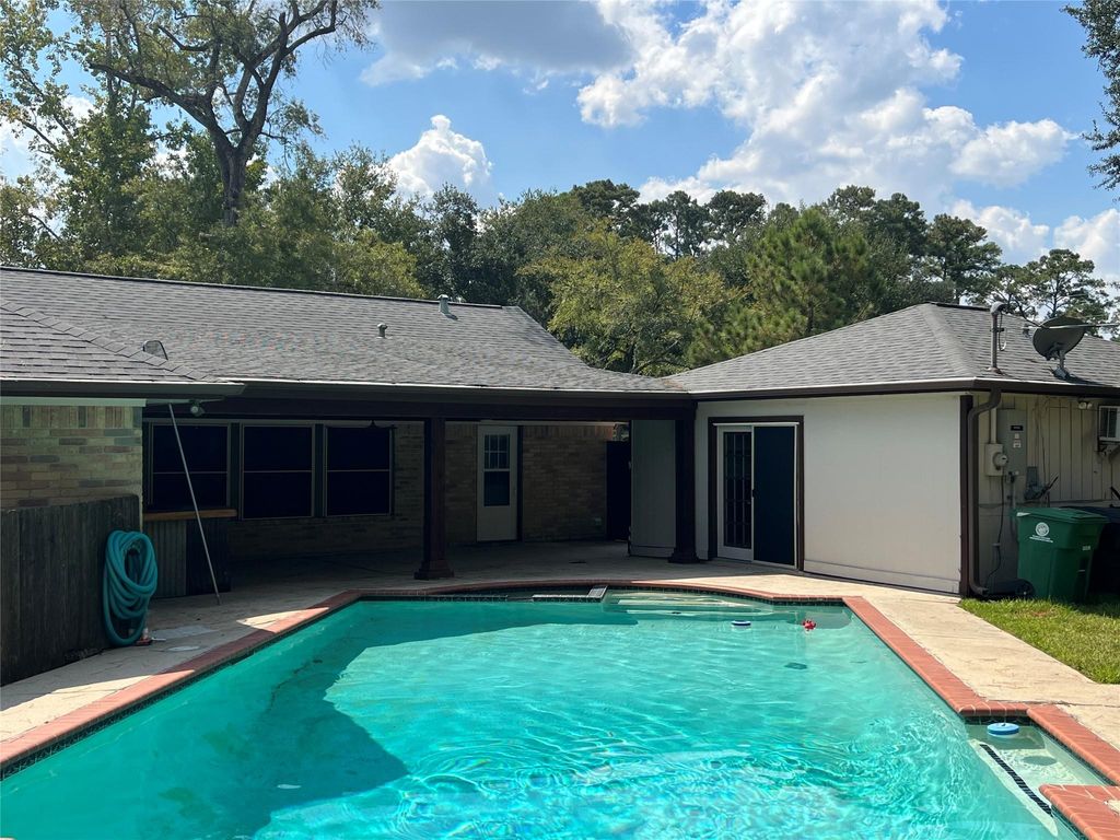 Photo of 903 Fairway Farms Lane Ln, Kingwood, TX 77339 (MLS # 12273944)