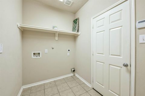 Tiny photo for 7114 Freesia Court, Baytown, TX 77521 (MLS # 85671008)