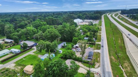 Photo of 25779 Almarie Drive, New Caney, TX 77357 (MLS # 19737347)