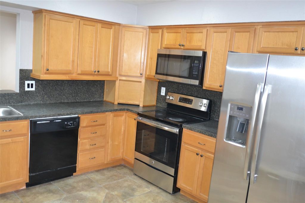 Photo of 12023 Woolford Drive, Houston, TX 77065 (MLS # 56583163)