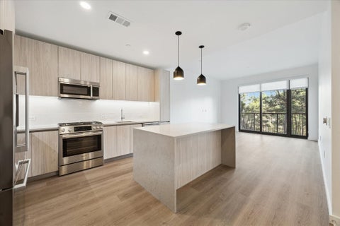 Photo of 1 Riva Row ROW #506, The Woodlands, TX 77380 (MLS # 20908140)