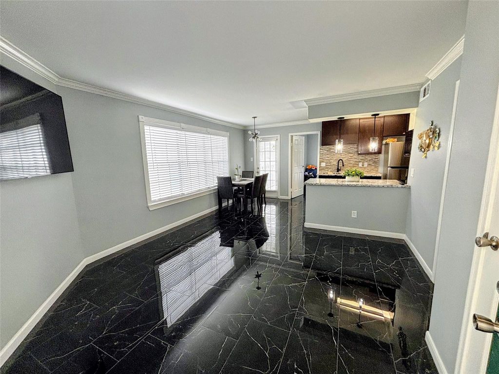 Photo of 12660 Ashford Point Drive #606, Houston, TX 77082 (MLS # 67731110)