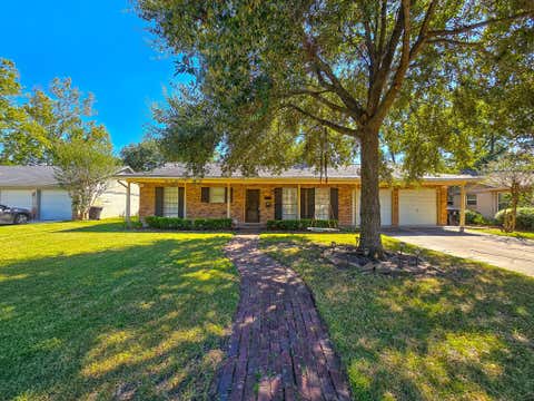 Photo of 9507 Meadowbriar Lane, Houston, TX 77063 (MLS # 94618024)