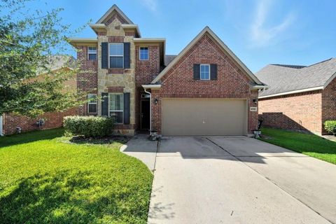 Photo of 10518 Sun River Falls Drive, Humble, TX 77396 (MLS # 98126673)