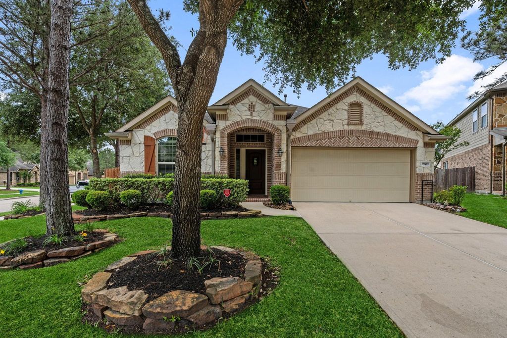 Photo of 13839 Slate Mountain Lane, Houston, TX 77044 (MLS # 54429131)