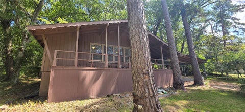 Photo of 131 Cove Drive, Point Blank, TX 77364 (MLS # 27519415)