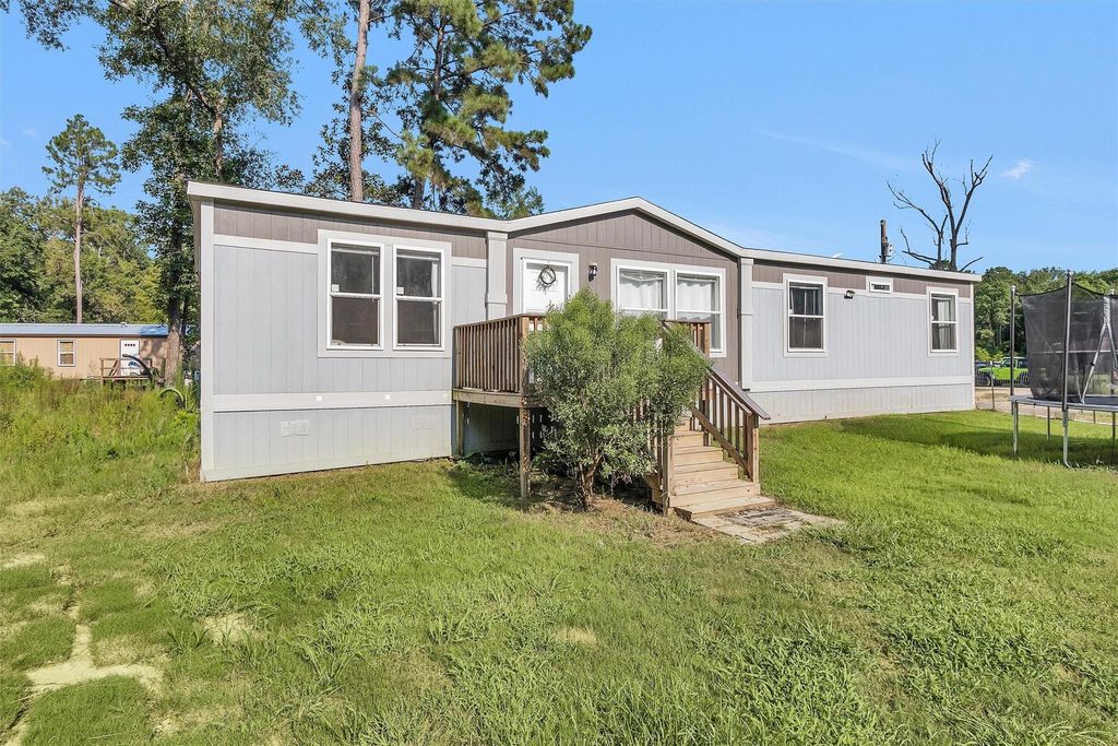 Photo of 595 County Road 2218, Cleveland, TX 77327 (MLS # 67386008)