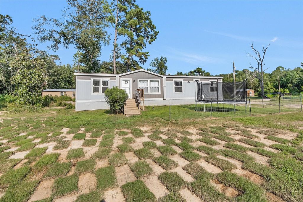 Photo of 595 County Road 2218, Cleveland, TX 77327 (MLS # 67386008)