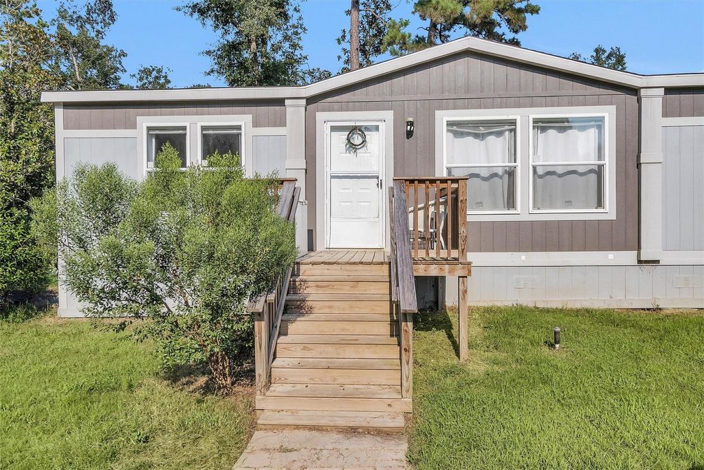 Photo of 595 County Road 2218, Cleveland, TX 77327 (MLS # 67386008)