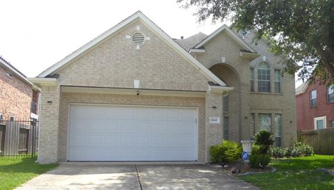 Photo of 10142 Lazy Lagoon, Houston, TX 77065 (MLS # 68742586)