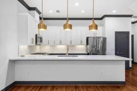 Photo of 1119 Saint Charles Street, Houston, TX 77003 (MLS # 75251969)