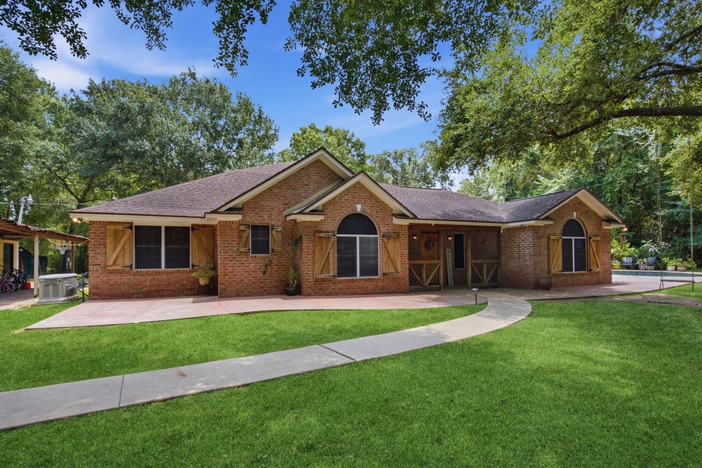 Photo of 223 Pin Oak Lane, Magnolia, TX 77354 (MLS # 76568537)