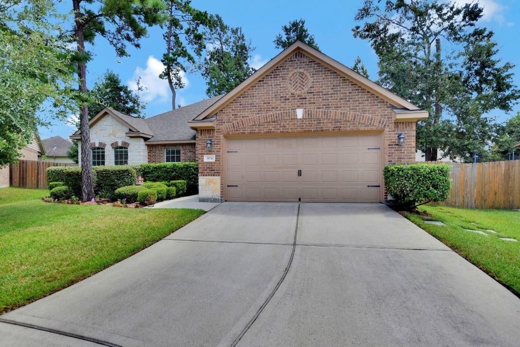 Photo of 974 Gowan Drive, Conroe, TX 77301 (MLS # 36940613)