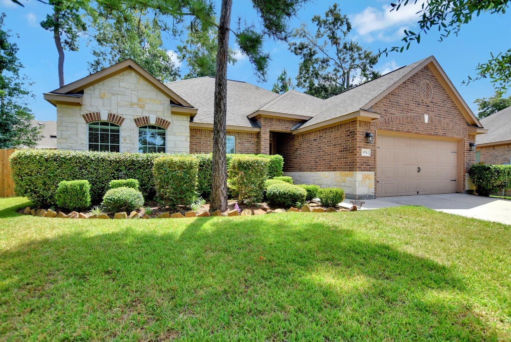 Photo of 974 Gowan Drive, Conroe, TX 77301 (MLS # 36940613)