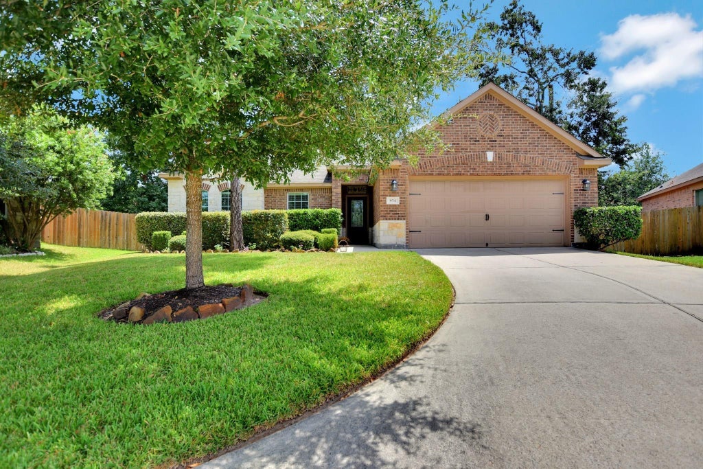 Photo of 974 Gowan Drive, Conroe, TX 77301 (MLS # 36940613)