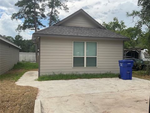 Photo of 11602 Vistawood Street, Willis, TX 77318 (MLS # 53897940)