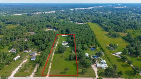 Photo of 905 County Road 379, Cleveland, TX 77328 (MLS # 60369161)